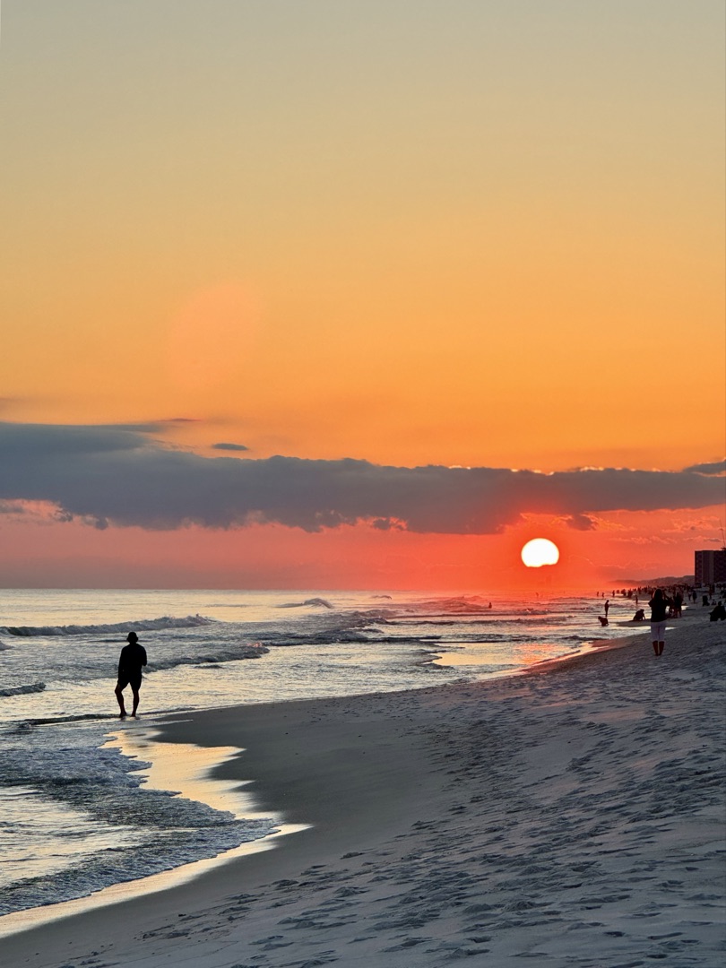 Stunning sunset along the Emerald Coast beach